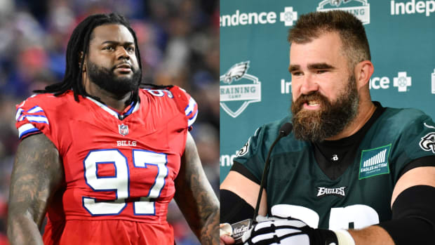 Bills defensive tackle Jordan Phillips walks off the field following a game. Eagles center Jason Kelce speaks with media in the offseason.